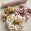 Luxury satin silk scrunchies set in gold champagne, ivory cream and blush pink pastel shades for women and girls